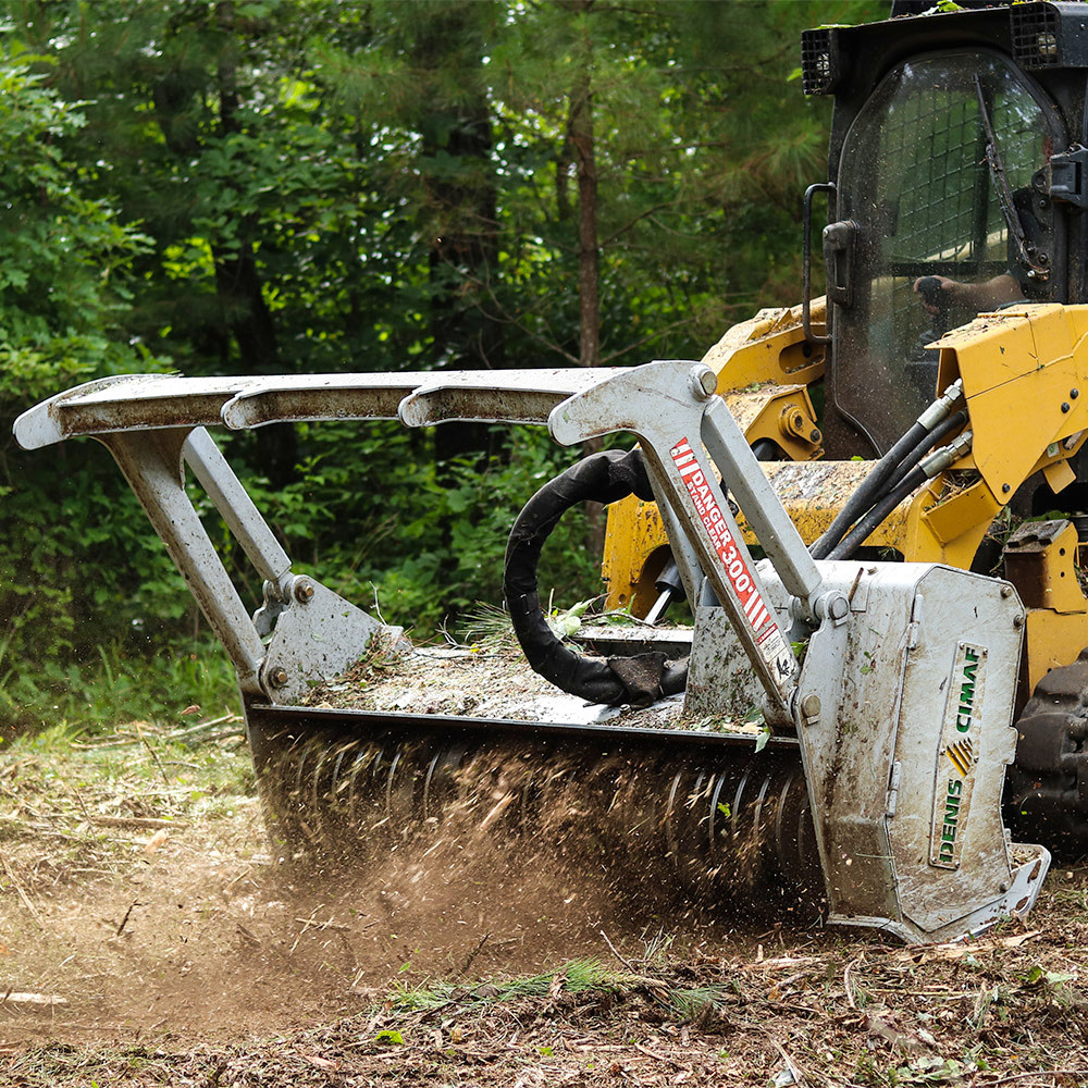 forestry mulching machine in action clearing overgrown land in chagrin valley